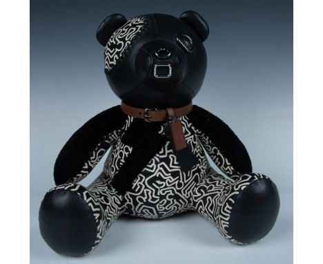 Fabulous black leather bear with iconic Keith Haring chalk outlines covering the body with a matching whip stitched eye patch