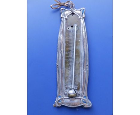 An art nouveau silver framed thermometer, having brass scales, makers 'H&amp;A', 6.5" high - losses to enamel in corners.