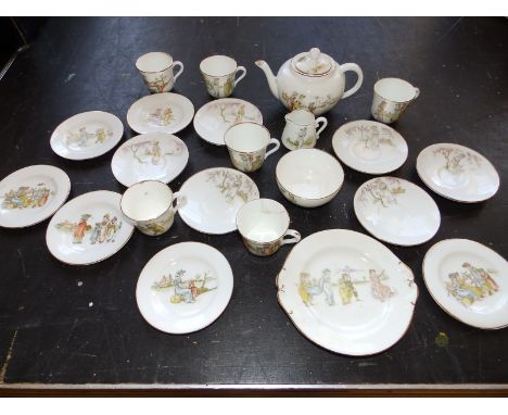 A 22 piece children's porcelain tea set decorated with Kate Greenaway style figures - one cup a/f.