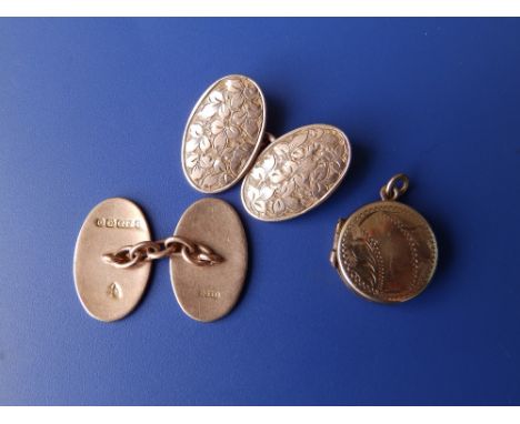A pair of 9ct oval cufflinks and a small locket. (3)