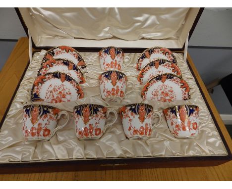 A cased set of six Royal Crown Derby Japan pattern teacups &amp; saucers. (12)