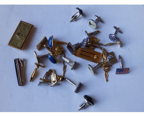 A collection of plated &amp; other cufflinks.