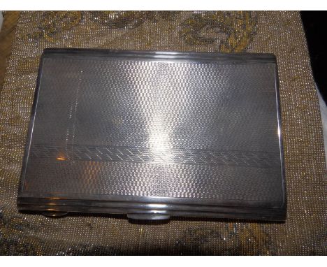 An art deco engine turned silver cigarette case - J.W. Tiptaft &amp; Son Ltd, Birmingham 1935.
