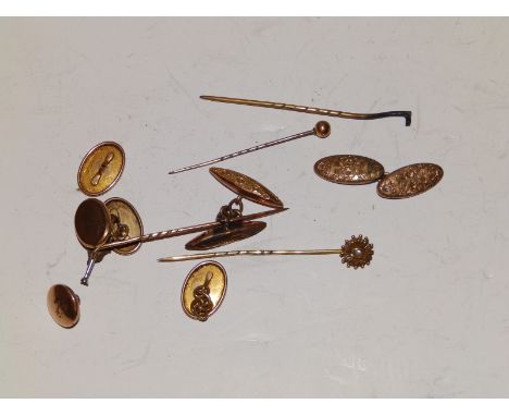 A fox head tie pin, cufflinks etc.