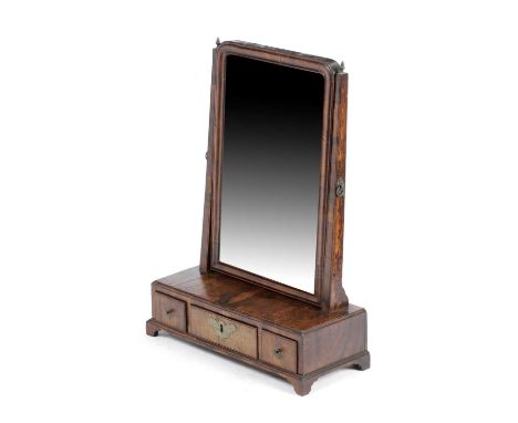 A GEORGE II WALNUT DRESSING TABLE MIRRORC.1735-40the rectangular plate above a box base with caddy moulding and fitted with t