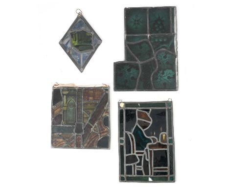 FOUR STAINED GLASS PANELS18TH CENTURY AND LATERincluding a man seated with a knife and fork, a variety of architectural featu