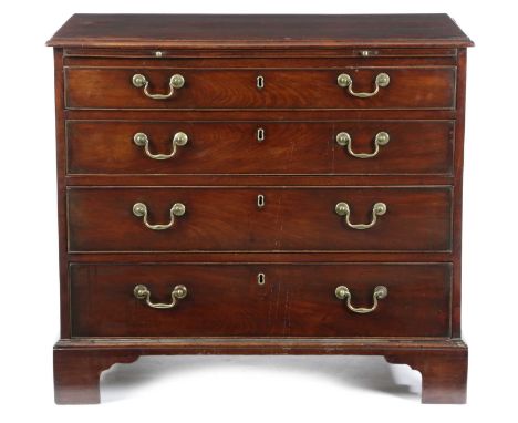 A GEORGE III MAHOGANY CHESTC.1770with a caddy moulded top above a brushing slide and four graduated long drawers, on shaped b