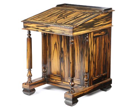 A RARE ANGLO-INDIAN CALAMANDER DAVENPORTCEYLONESE, MID-19TH CENTURYthe hinged fall revealing four drawers and a pigeonhole ab