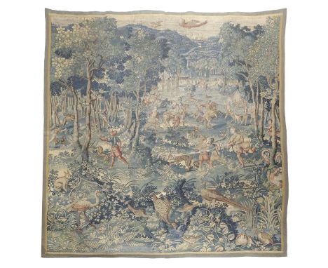 A FLEMISH TAPESTRY FRAGMENT16TH CENTURYwoven in silks and wool depicting a hunting scene, with horsemen and men on foot with 