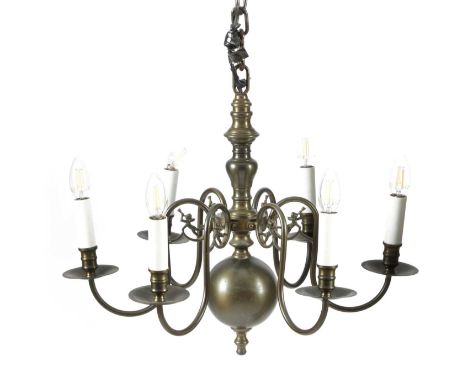 A DUTCH BRASS SIX-LIGHT CHANDELIERIN BAROQUE STYLE, LATE 19TH CENTURYwith scroll branches with angel-mounted scrolls issuing 