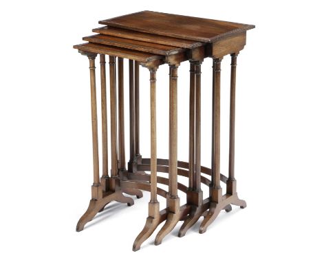 A QUARTETTO NEST OF MAHOGANY OCCASIONAL TABLESIN REGENCY STYLE, 19TH CENTURYeach with a rectangular beaded top on ring turned