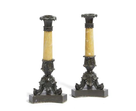 A PAIR OF FRENCH LOUIS-PHILIPPE BRONZE AND SIENA MARBLE CANDLESTICKSC.1830-40each with a foliate nozzle above a tapering marb
