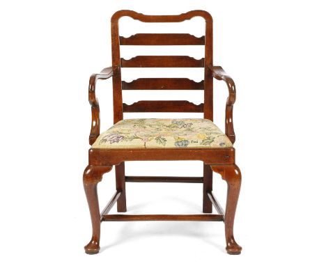 A GEORGE II VIRGINIAN WALNUT ARMCHAIRC.1750with a ladderback and shepherd's crook arms above a drop-in needlework seat worked