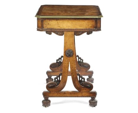 λ A WILLIAM IV AMBOYNA AND BRASS MOUNTED WRITING TABLEATTRIBUTED TO TAPRELL & HOLLAND C.1830with egg and dart mouldings, the 