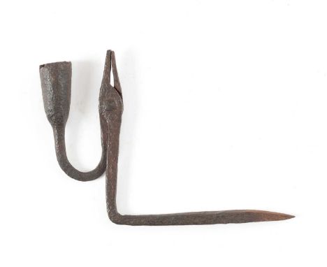 A GEORGE III WROUGHT IRON WALL MOUNTED RUSHNIP AND CANDLEHOLDERC.1800with rounded jaws and seamless tapering socket on a righ