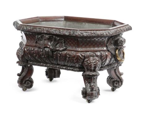 A VICTORIAN MAHOGANY WINE COOLERIN GEORGE II STYLE, MID-19TH CENTURYall-over carved with leaves, scrolls, flowers with lattic