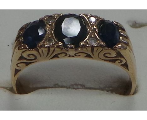 Antique style gold diamond and sapphire ring