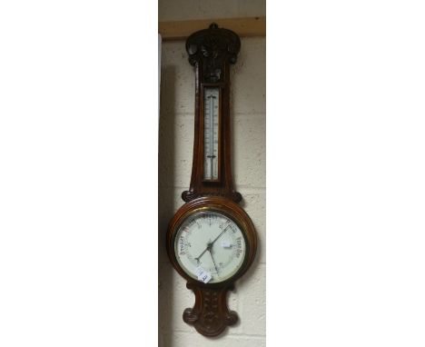 Carved oak barometer