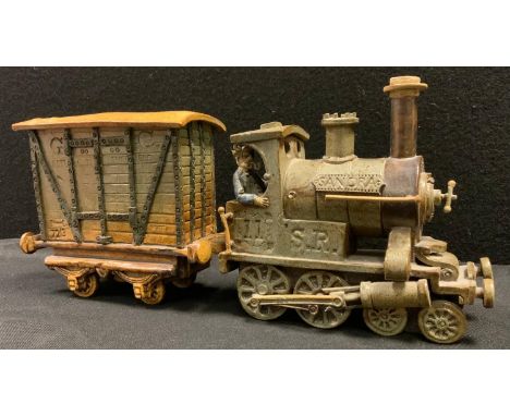 A Charles Forester ceramics studio pottery Locomotive tank engine and goods wagon, 4-4-0 SR locomotive, mottled brown and tur