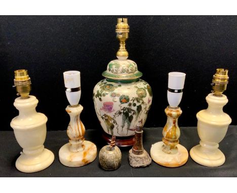 Lighting - a pair of onyx table lamps;  others alabaster etc;  a serpentine model lighthouse etc 