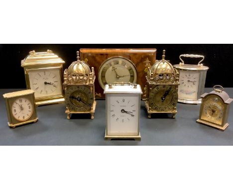 Two Smiths 8 day lantern clocks (17cm high ); a Swiza carriage type clock; another; others including Hermle, Metamac and Jean