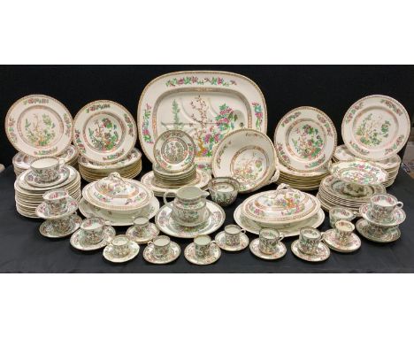 An extensive 19th century and later Indian tree pattern dinner service inc meat draining platter, pair of oval lidded tureens