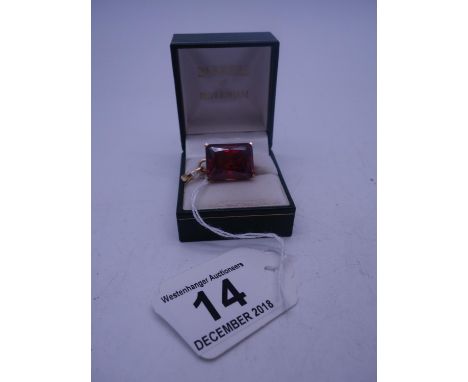 Superb ruby coloured pendant, the stone measures 1/2" long 1/2" wide, 1/4" deep, set within a yellow 18ct GOLDsetting, total 