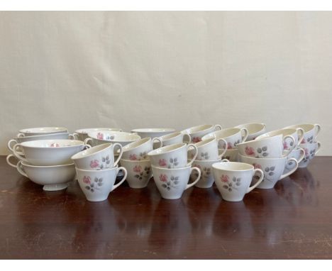 A part set of Royal Doulton Pillar Rose pattern china to include twelve soup bowls, eleven coffee cups and twelve tea cups wi
