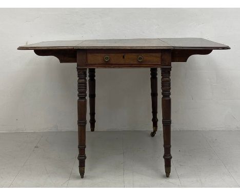 A 19th century mahogany drop leaf Pembroke table having a rectangular thumb-moulded top over a single frieze drawer and oppos