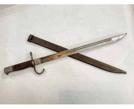 A Japanese sword bayonet 30th Year Type by Moji subplant of Kokura Arsenal, with steel scabbard 