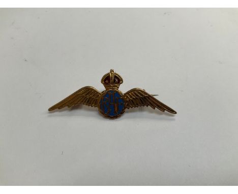 A 9ct gold RAF sweetheart brooch, central blue enamel RAF lettering with red enamel to crown, flanked by wings 