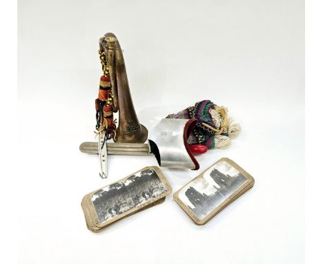 A stereo viewer together with a quantity of stereo photographs including WWI themes, together with a copper and brass militar