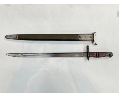 A WWI US 1917 bayonet by Remington, dated 1917, with a flaming grenade stamp, with scabbard 