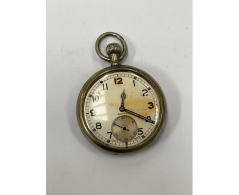 A military issue Doxa pocket watch with Arabic numerated dial and sweep second subsidiary, marked with broad arrow and G.S.T.