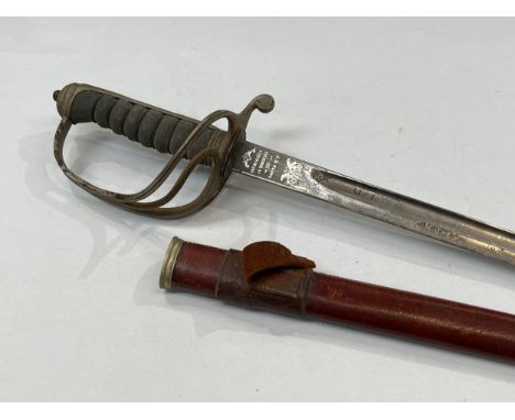 A George V Artillery Officer's sword, shagreen grip, engraved blade by J.G. Plumb, initials of the serviceman (B.N.L.D.) engr