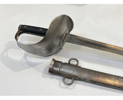 An 1899 pattern cavalry troopers' sword, the sheet steel bowl hilt with leather riveted grip joining a slightly curved flat-b