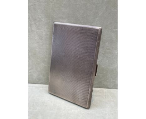 An S.J. Rose &amp; Son silver cigarette case, all-over engine-turned design, inscription to gilded interior 'MAY 1946 TO LT. 
