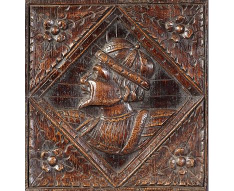 A good Henry VIII carved oak Romayne-type panel, circa 1540

Finely carved with a male portrait bust, with beard and wearing 