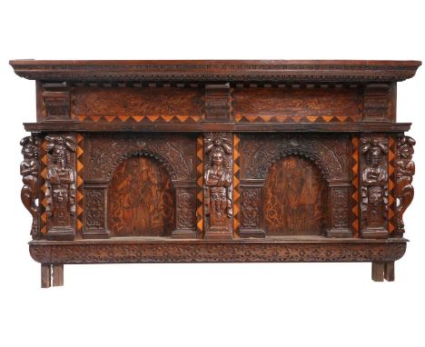 An impressive Elizabeth I oak, fruitwood, inlaid and penwork headboard or overmantel, circa 1570Having a pair of panels, deco