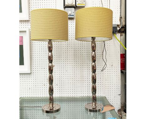 TABLE LAMPS, a pair, polished metal, with green fabric shades, 67cm H. (2) 