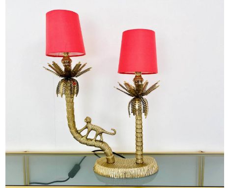 TABLE LAMP, two branch, gilt metal, in the form of a monkey climbing trees, with shades, 50cm x 32cm x 15cm. 
