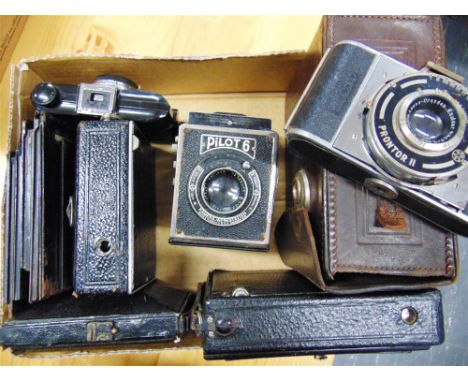 SEVEN ASSORTED CAMERAS  comprising a Huttig folding bellows camera, with a Helios 1:8 f=130mm lens; Ernemann Heag II folding 