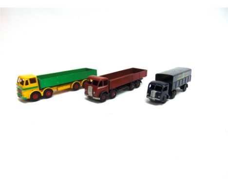THREE DINKY DIECAST MODEL LORRIES  comprising a Dinky No.934, Leyland Octopus Wagon, yellow and green with red grooved hubs, 