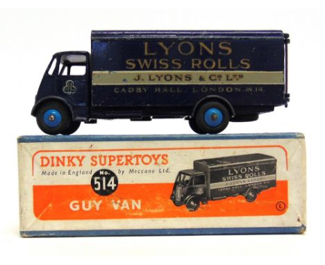 A DINKY NO.514, GUY VAN 'LYONS SWISS ROLLS'  first type cab, dark blue with mid blue ridged hubs, fair condition, boxed, the 