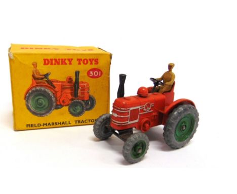 A DINKY NO.301, FIELD-MARSHAL TRACTOR  orange with green hubs, very good condition, boxed, the box good to fair (slightly cre