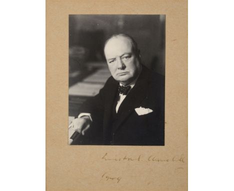 WINSTON CHURCHILL - A BLACK & WHITE PORTRAIT PHOTOGRAPH  by Walter Stoneman of J. Russell & Sons, London, the mount signed an