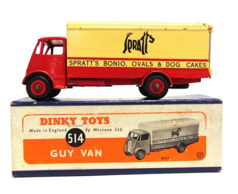 A DINKY NO.514, GUY VAN 'SPRATTS'  first type cab, red and cream with red grooved hubs, good condition, boxed, the box good.