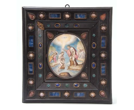 A 17TH CENTURY ITALIAN EBONY FRAME with stepped centre enclosing an oval watercolour drawing depicting a religious scene; the