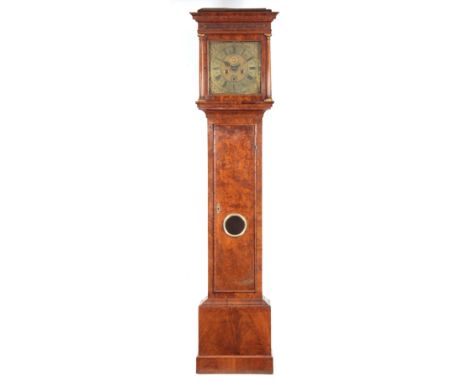 SAMUAL STEVENS, LONDON. AN EARLY 18TH CENTURY FIGURED WALNUT LONGCASE CLOCK the moulded top hood with blind fret frieze and t