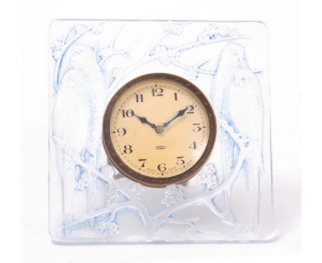 R LALIQUE A RELIEF MOULDED 'INSEPARABLES'  EASLE BACK CLOCK tinted in blue staining and centred by a Swiss timepiece movement